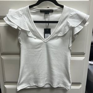 Veronica Beard V-Neck Ribbed Tee with cotton ruffle shoulders.